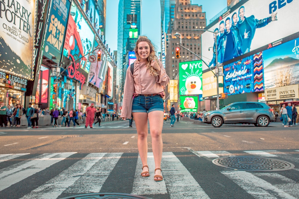 woman walking on Time Square, New York