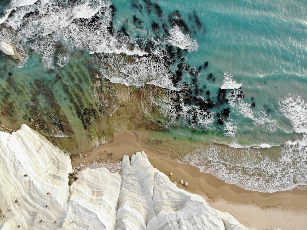 an aerial view of a beach and ocean