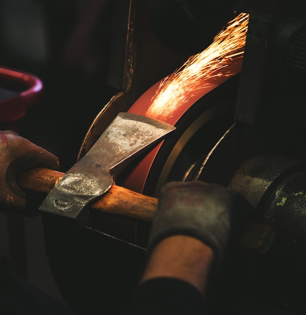 person holding brown handheld tool