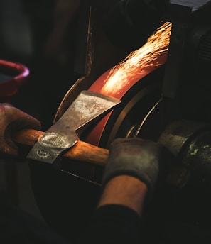 person holding brown handheld tool