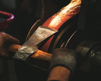 person holding brown handheld tool