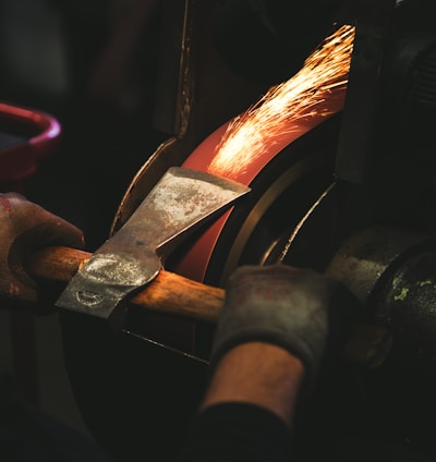 person holding brown handheld tool