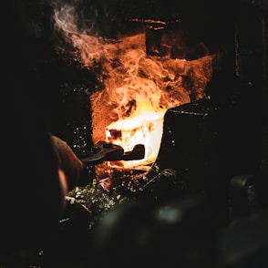 person melting iron