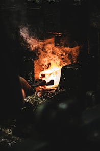 person melting iron