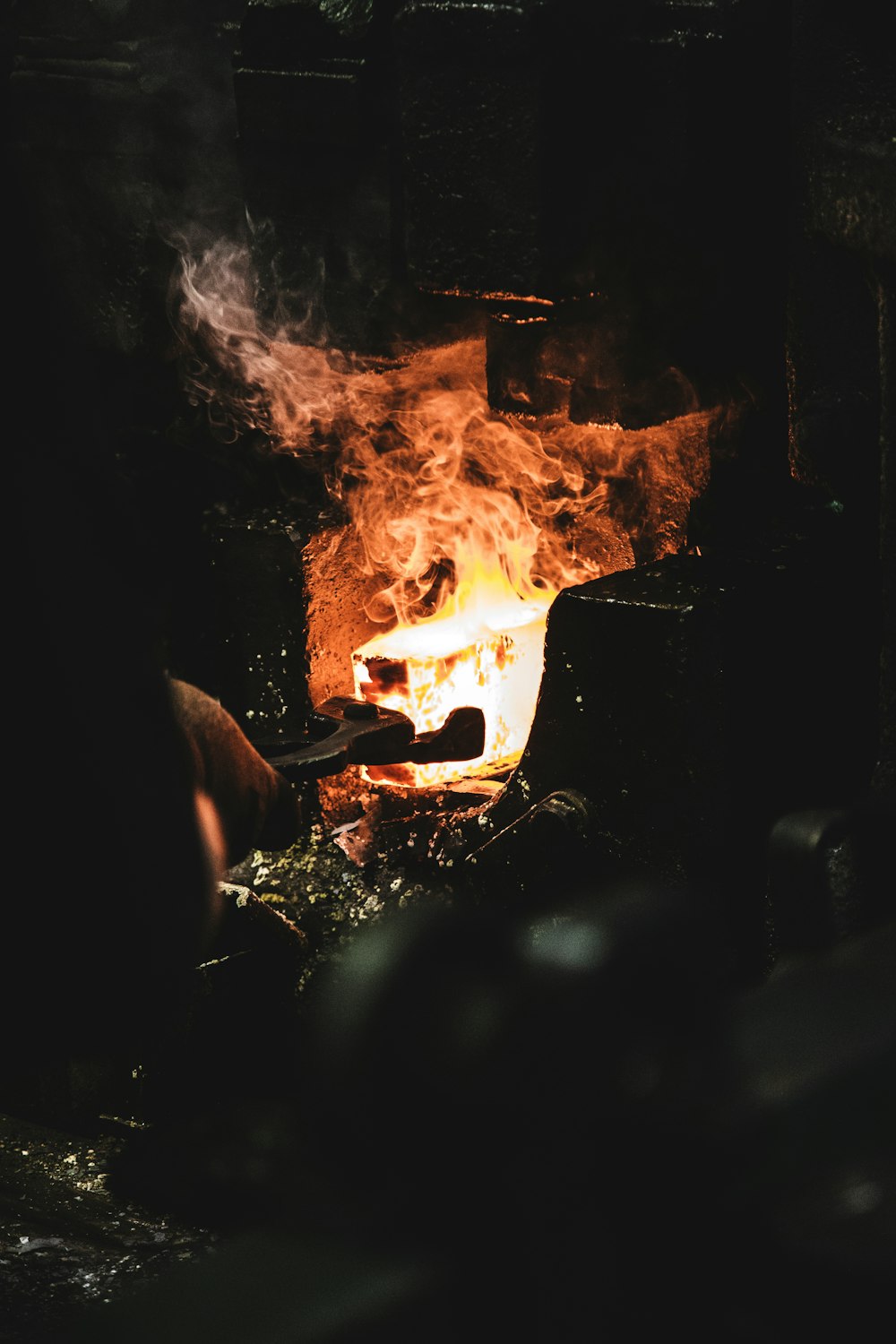 person melting iron