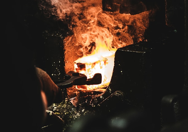 person melting iron