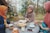 woman sitting in front of table