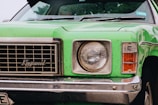 green and silver Kingswood car