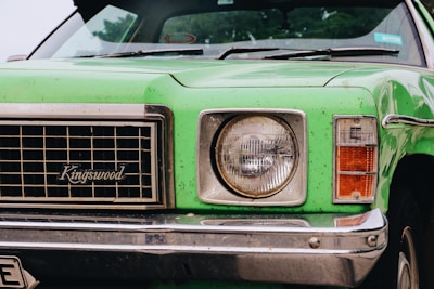 green and silver Kingswood car