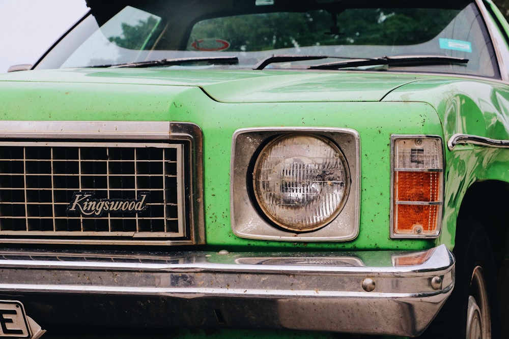 green and silver Kingswood car