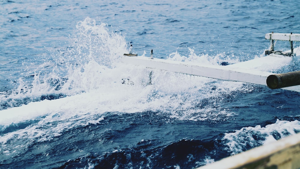 white boat on body of water