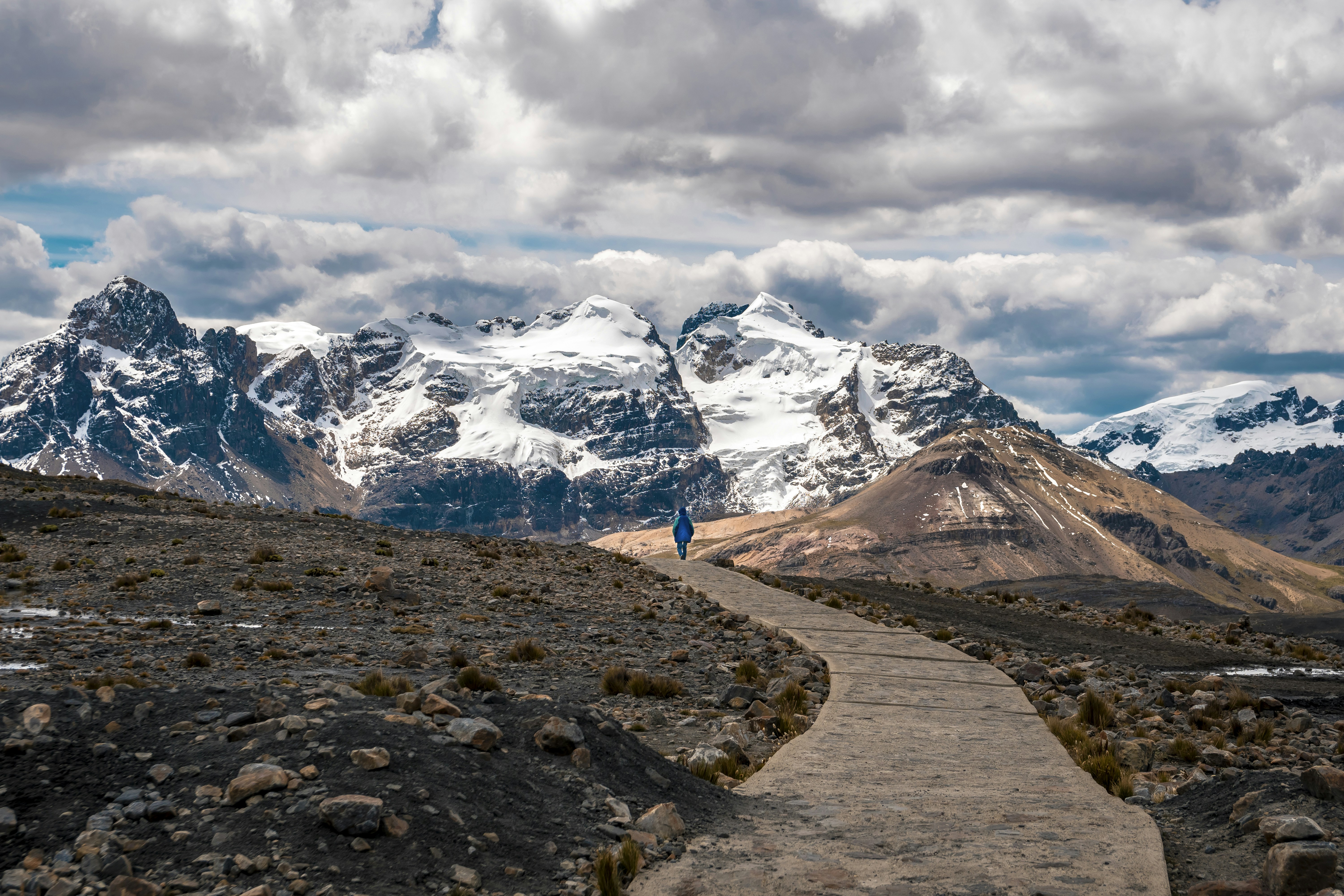person walking toward snow-capped mountain, Oh mountains…