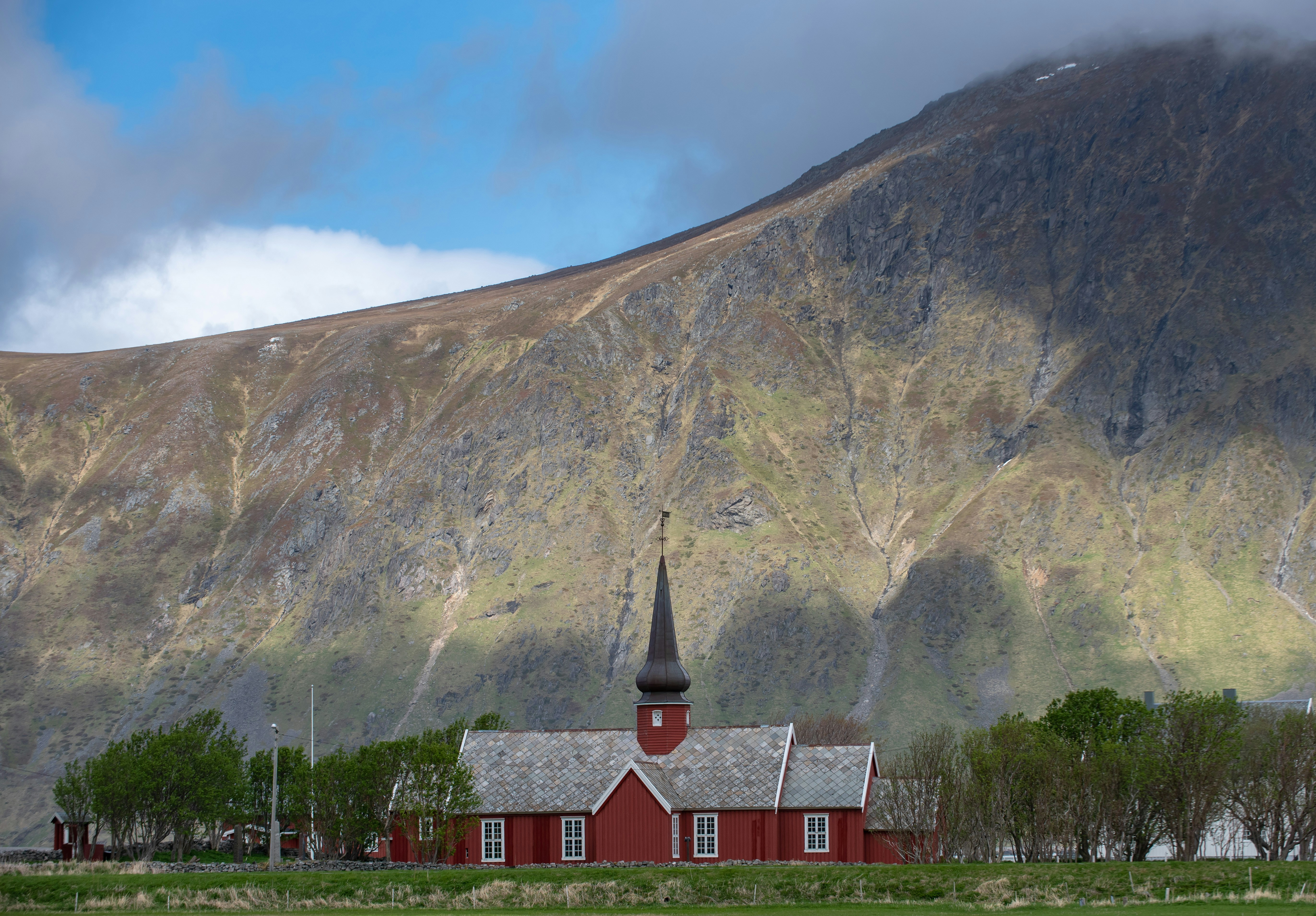 red and gray house under green mountain at daytime, Built with Russian timber and inspiration