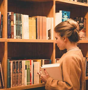 woman holding book