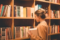 woman holding book