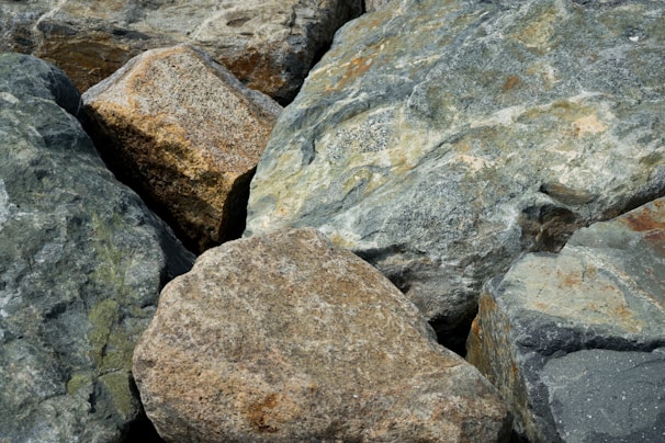 Crushed mineral rocks spread out on a sorting platform.