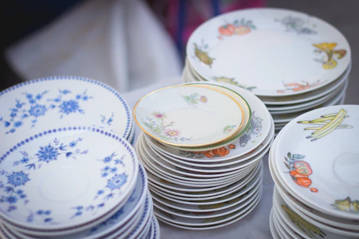 Stacks of high-quality US imported plates ready for packaging printing, arranged neatly in our Jaipur facility.