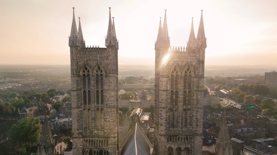 high angle view photography of brown buildings in Lincoln Cathedral United Kingdom