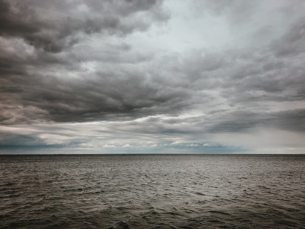 calm sea under blue sky