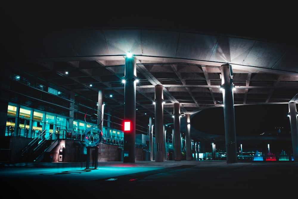 vehicle station with turned on light fixtures at night