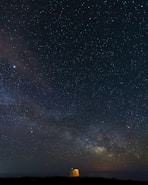 building under stars during nighttime