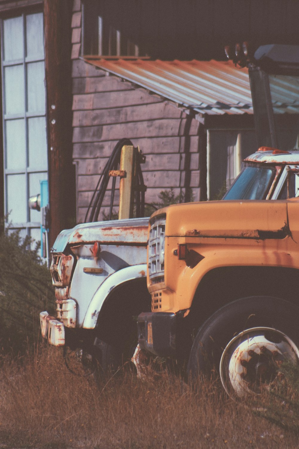 two vehicles parked near house