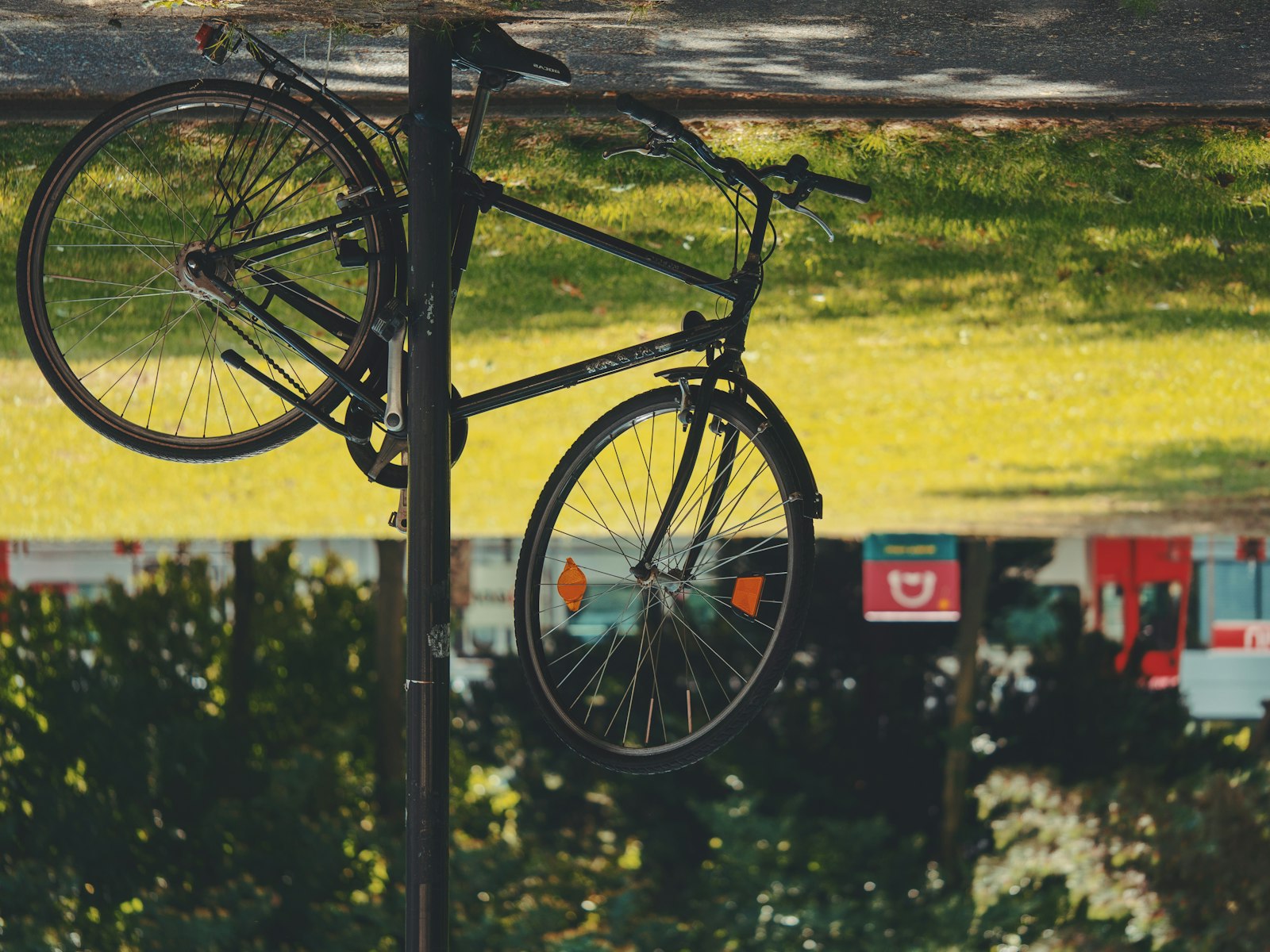 LUMIX G VARIO 35-100/F2.8II sample photo. Bicycle park beside steel photography