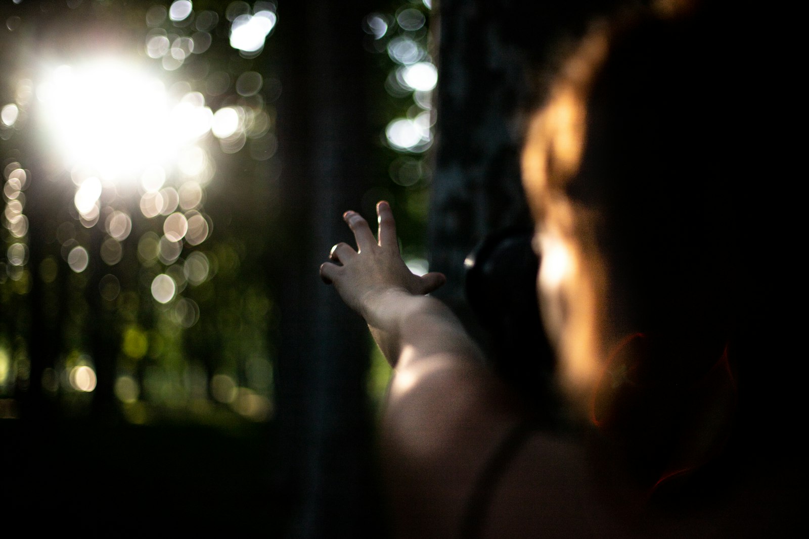 Canon EOS 6D Mark II + Canon EF 50mm F1.4 USM sample photo. Person extending arms near photography