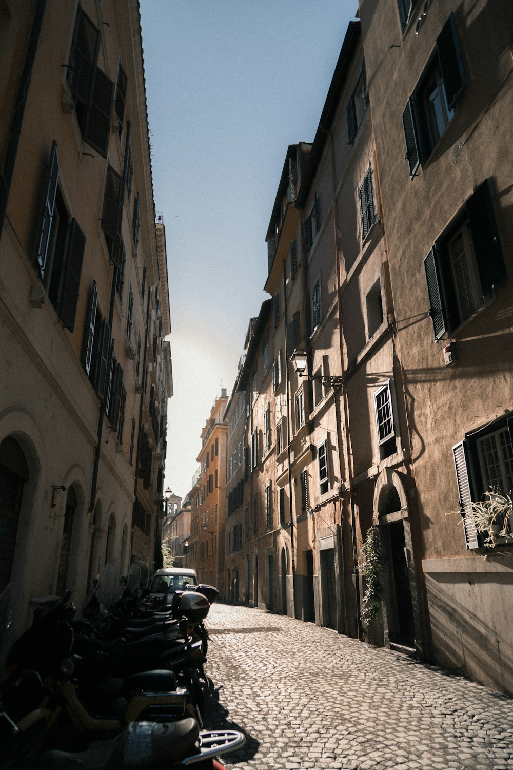 architectural photography of gray alleyway