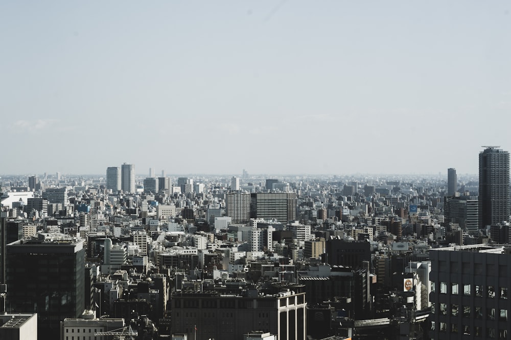 buildings under white clouds