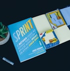 Sprint book and black marker