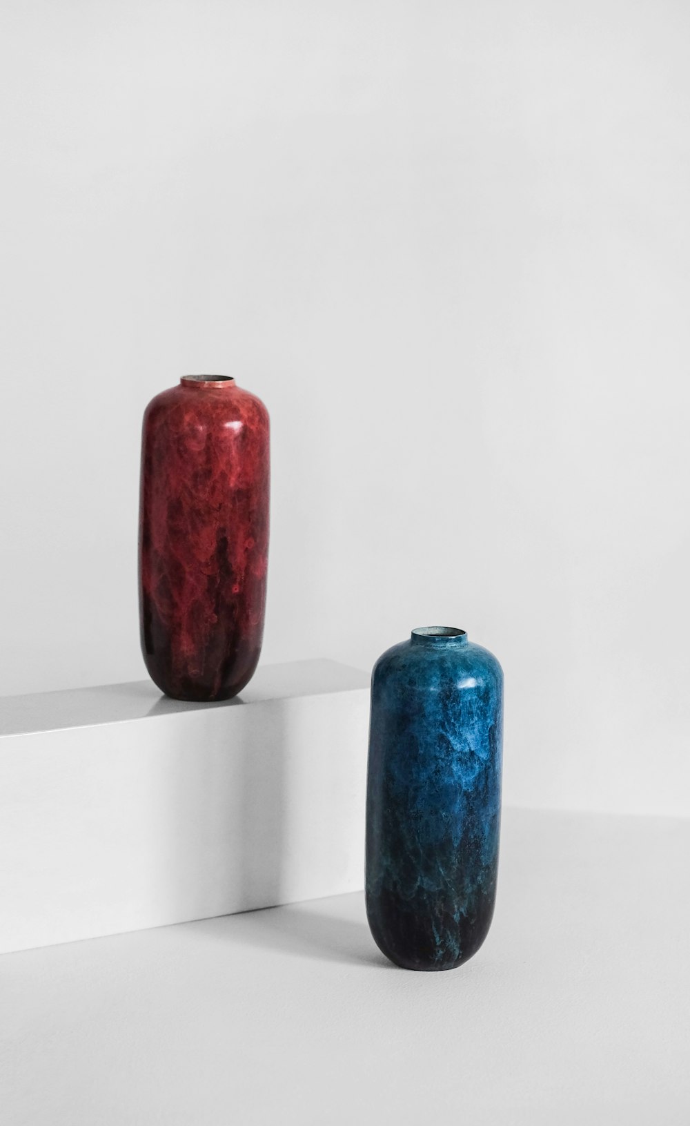 red and blue ceramic jars