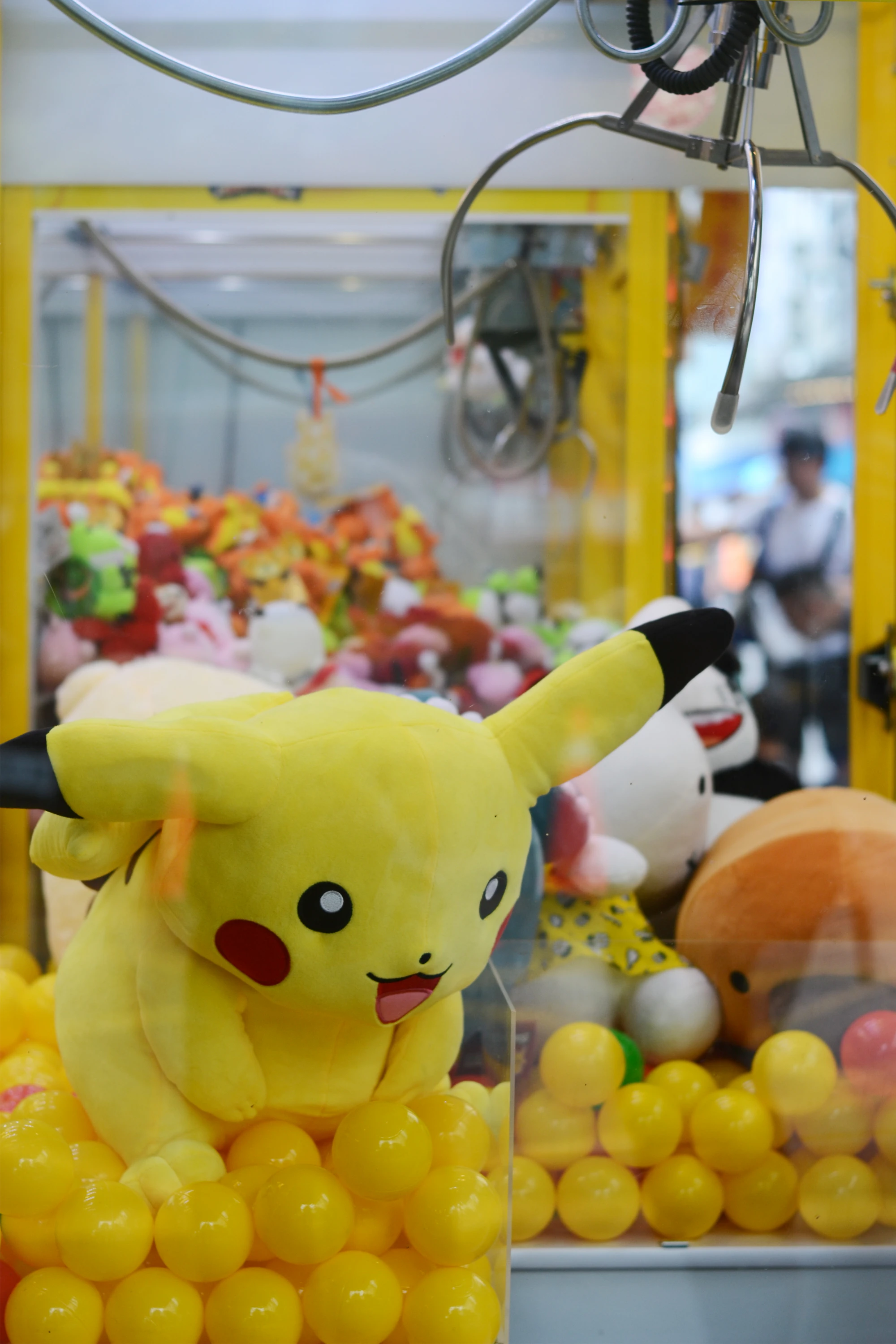 Plush toy inside a claw machine