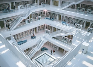 people walking inside library