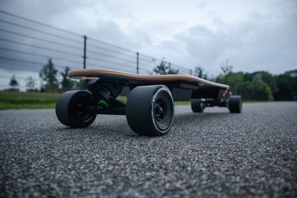 longboard on concrete road