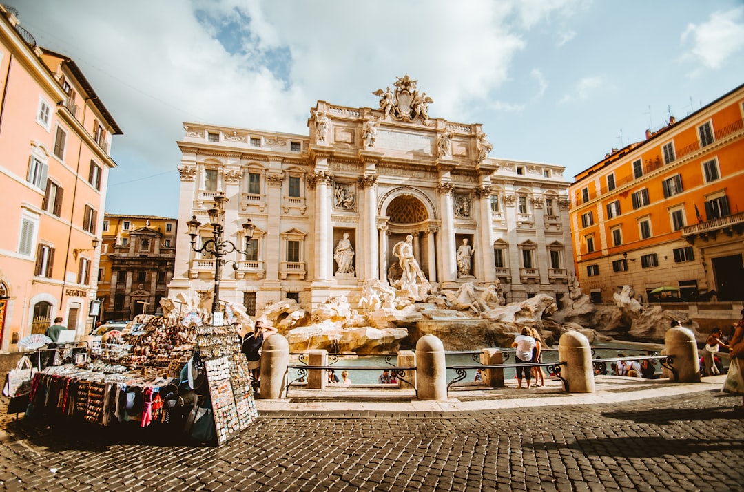  man standing in front of statue courtyard forecourt