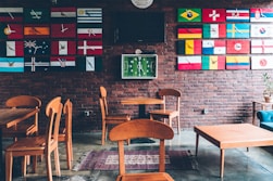 three brown wooden tables