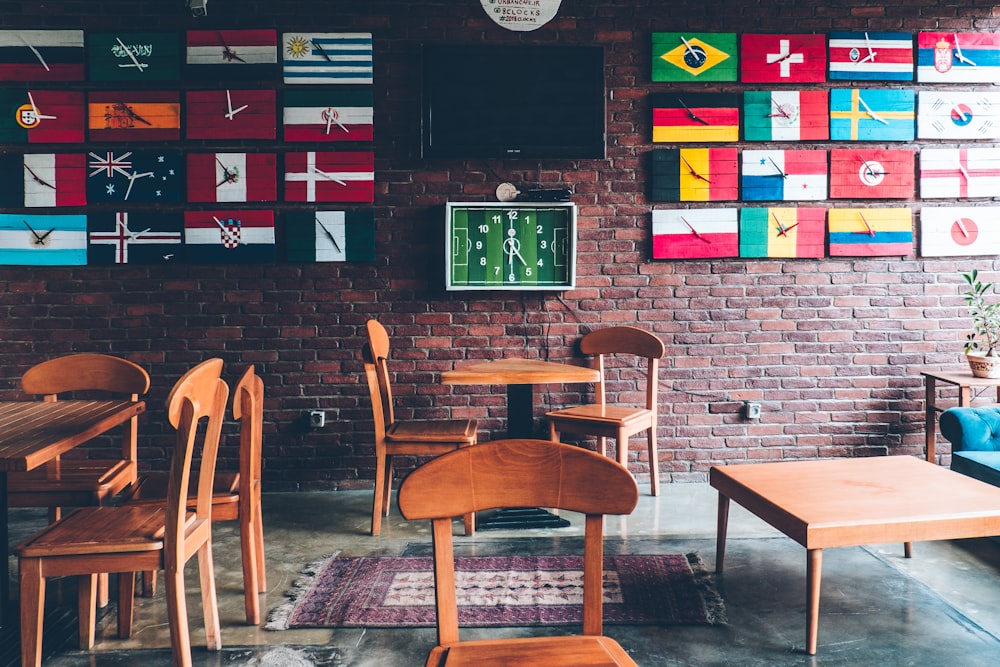 three brown wooden tables