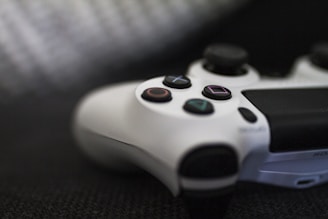 closeup of white Sony PS controller
