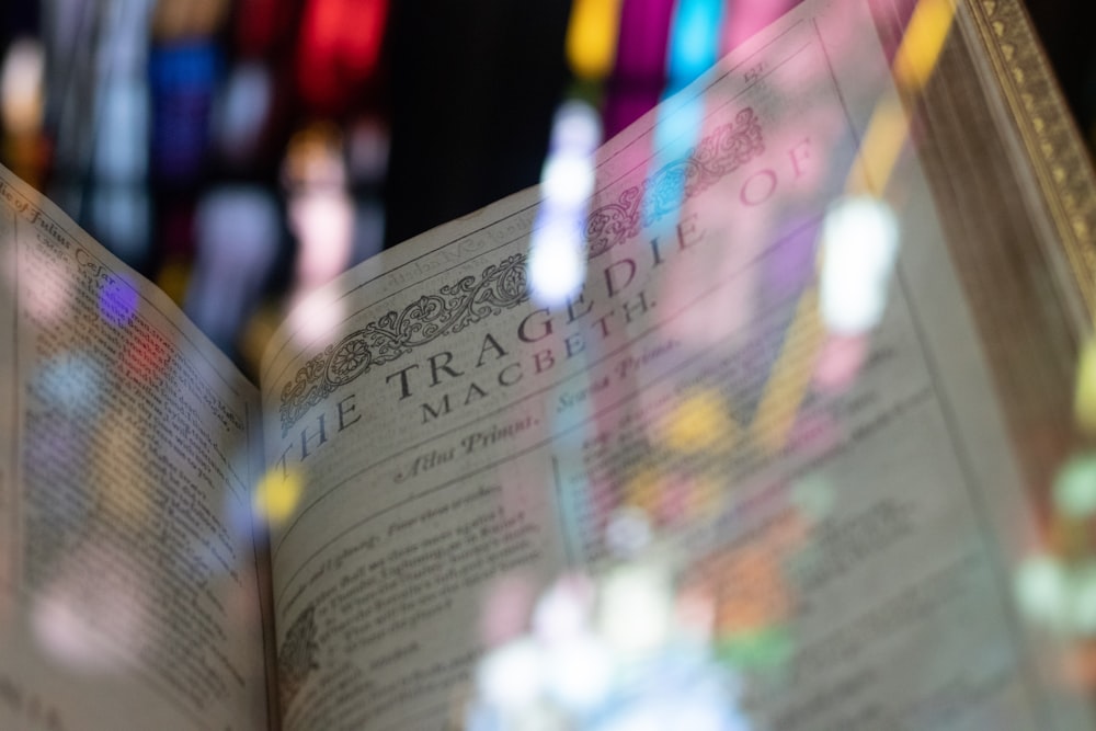 a close up of an open book on a table