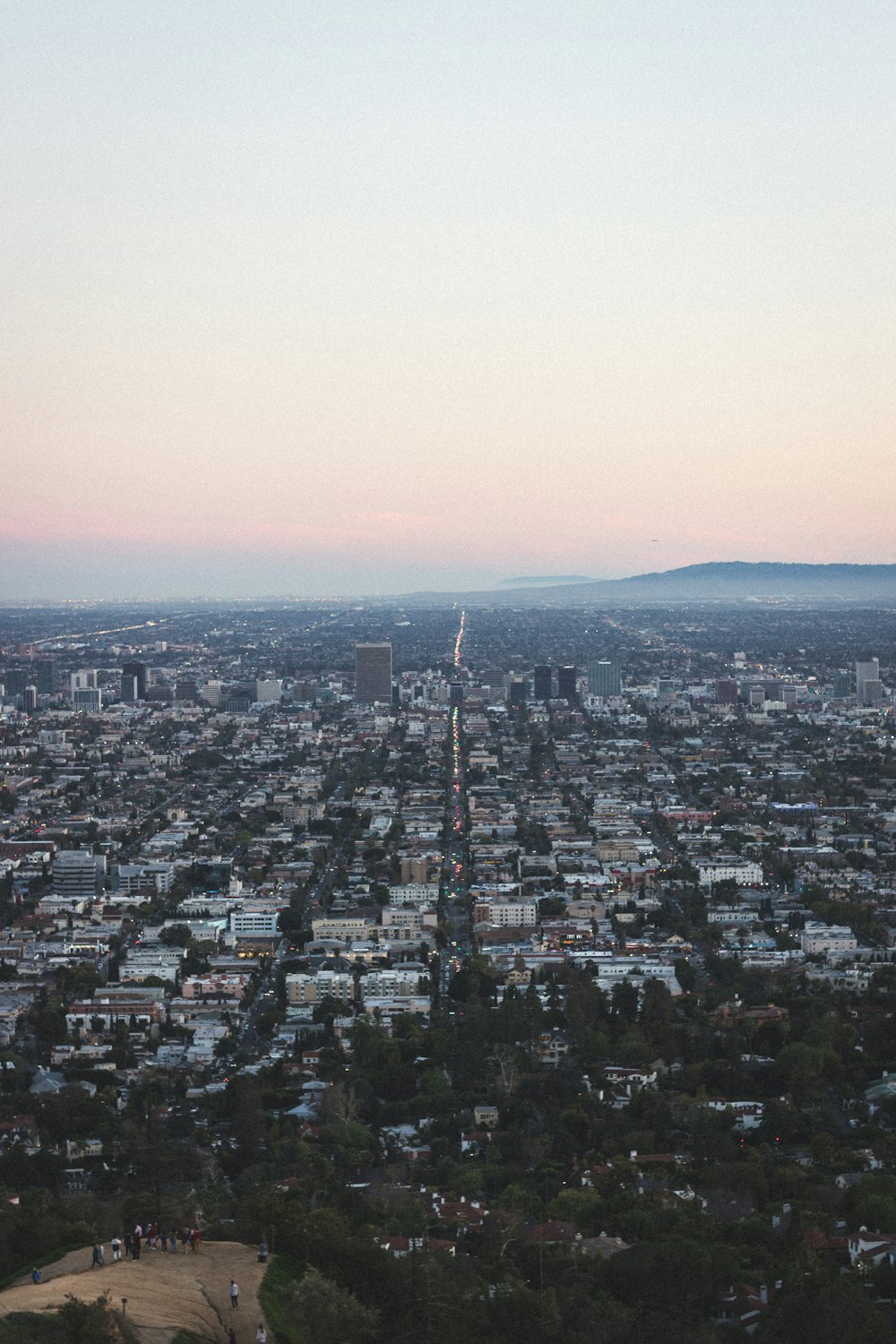 aerial view of city under cloudy sky