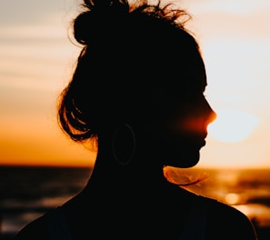 silhouette of woman looking sideways