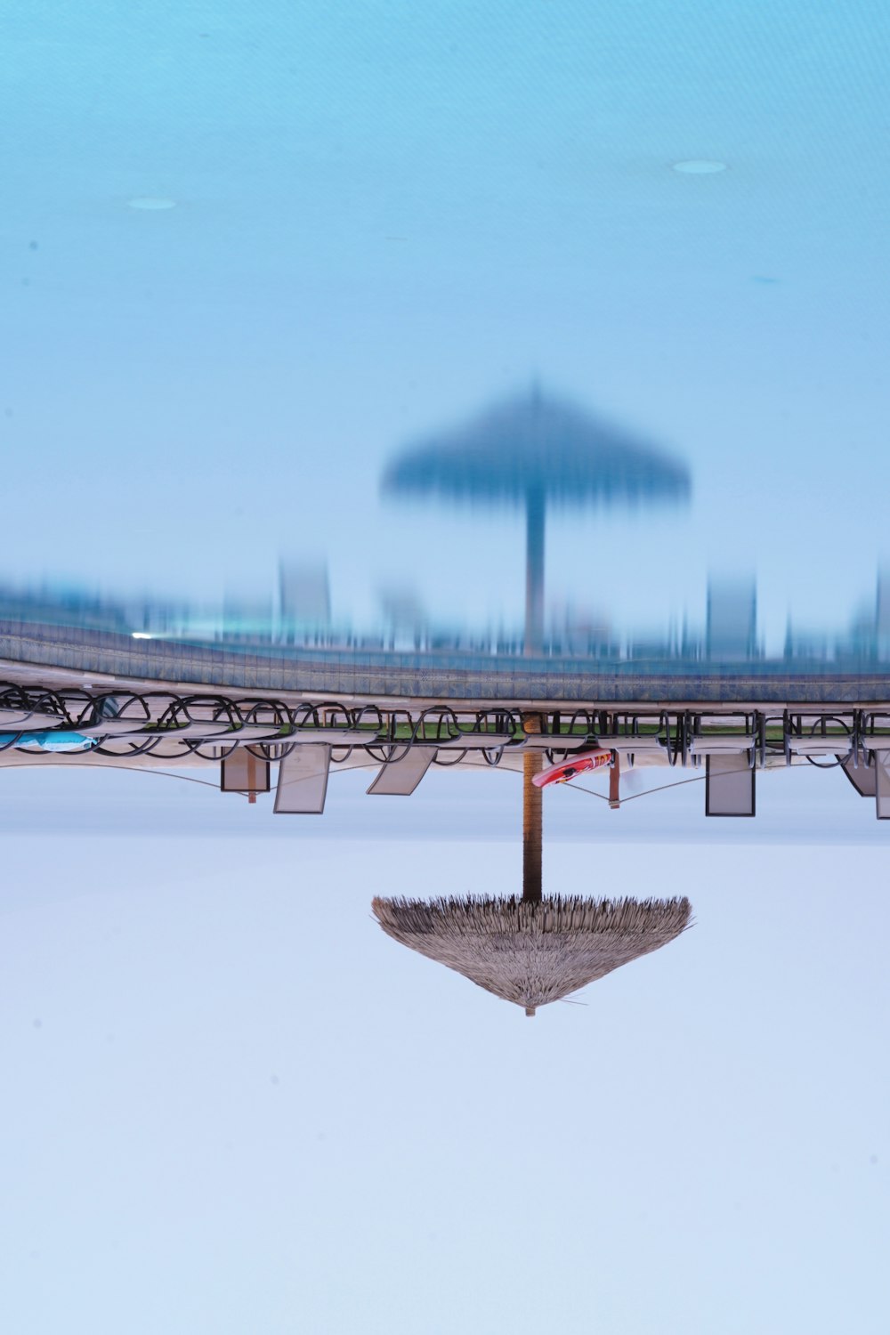 patio umbrella reflecting on water