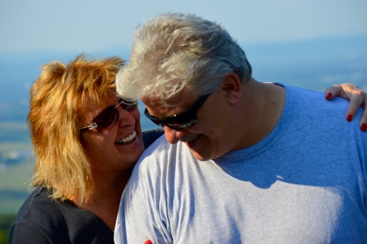A senior couple enjoying a leisure activity together, smiling and relaxed.
