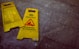 two Caution signages