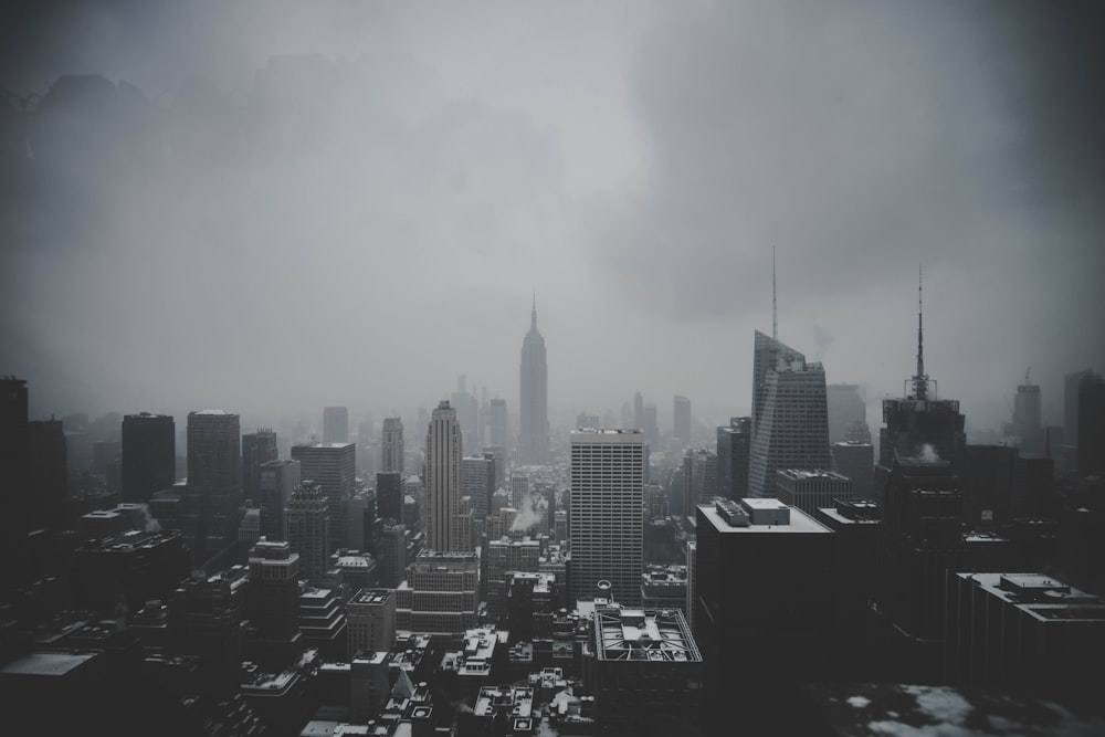 high-rise buildings under the cloudy sky