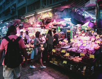 people standing at the market during nighttime