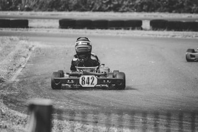 man riding go kart talented zoom background