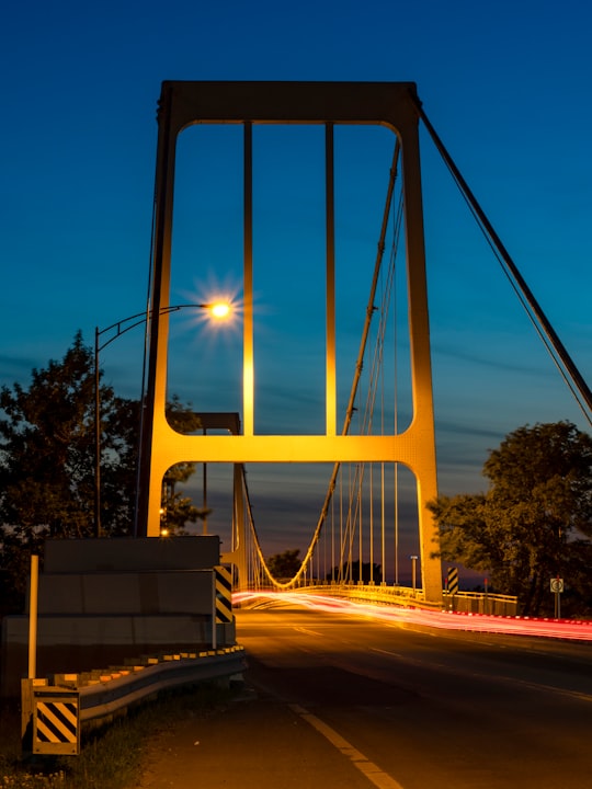 gray bridge during nighttime in Beauharnois Canada