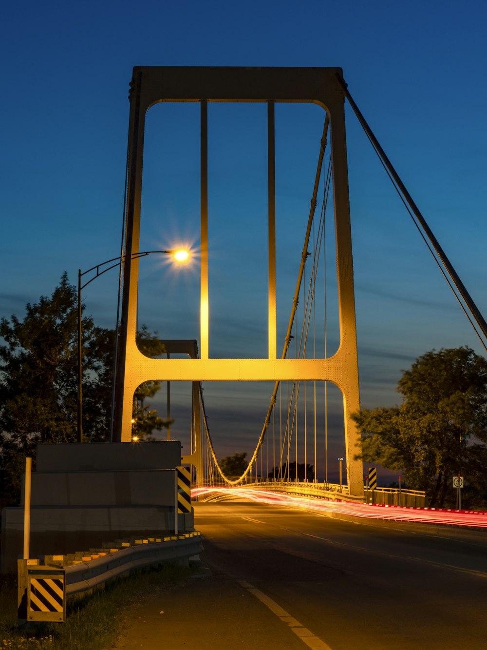 gray bridge during nighttime